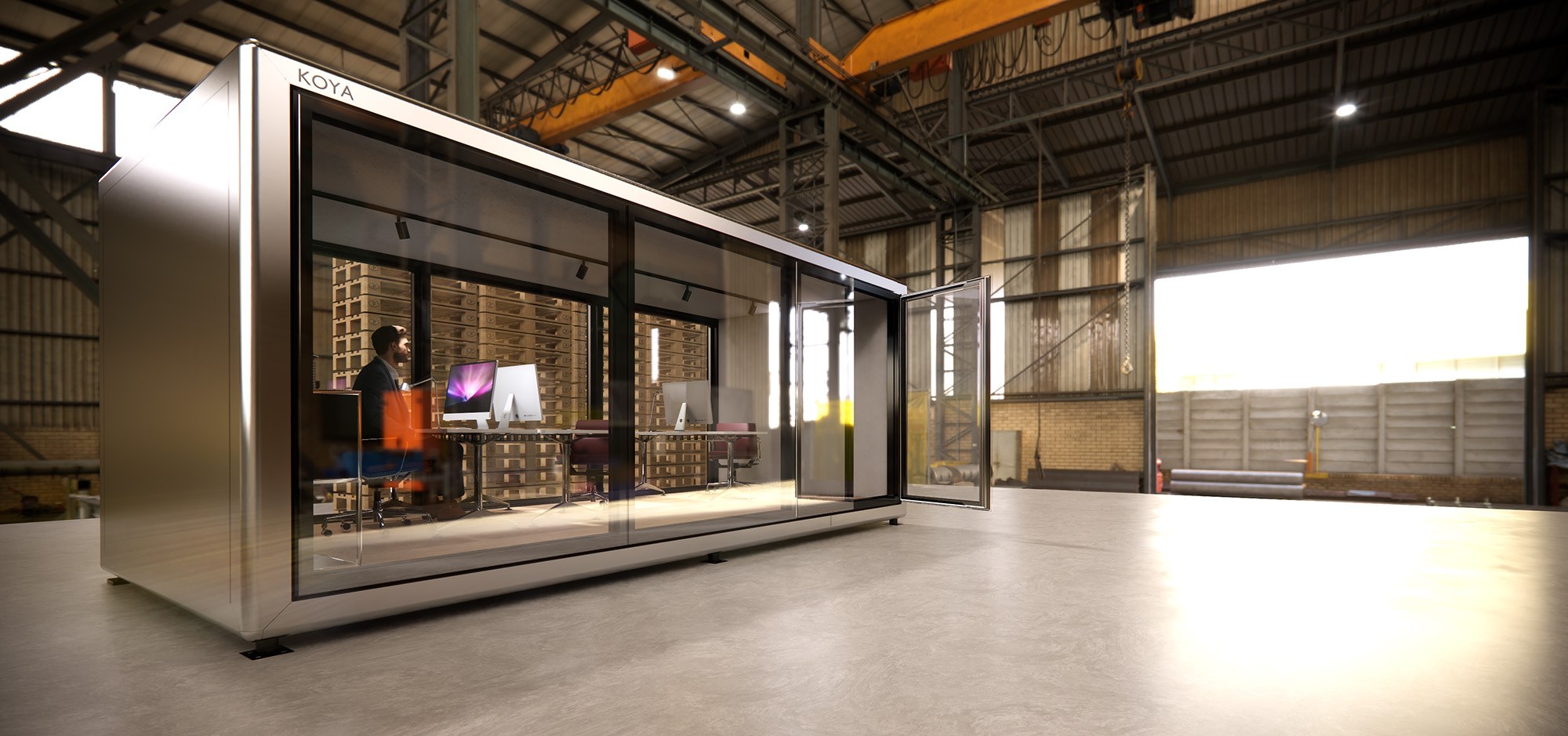 Visualisierung: KOYA Büromodul mit Glasfront und Glastür in einer Industriehalle, innen ein Arbeitsplatz